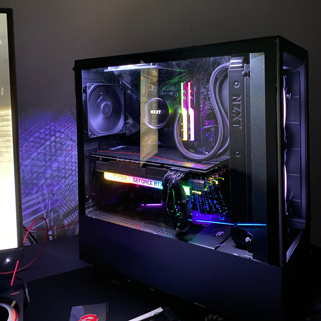 Open computer case with visible components on a dark background